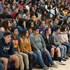 A rapt student audience listens quietly.